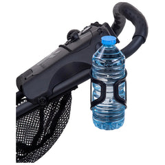 A water bottle is secured in a holder attached to the handle of a stroller while a black mesh storage compartment is visible beneath it in a neutral setting.