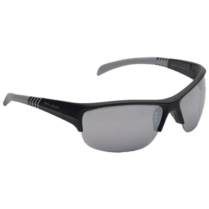 A pair of black sunglasses is displayed angled slightly to the right showing lens reflections and gray temple arms with a striped design near the hinges against a white background.