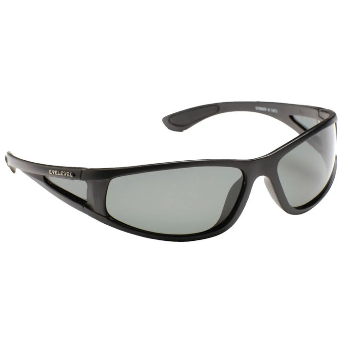 Sunglasses with a sleek black frame are positioned at an angle showcasing their dark lenses designed for sun protection suitable for outdoor activities or casual wear.