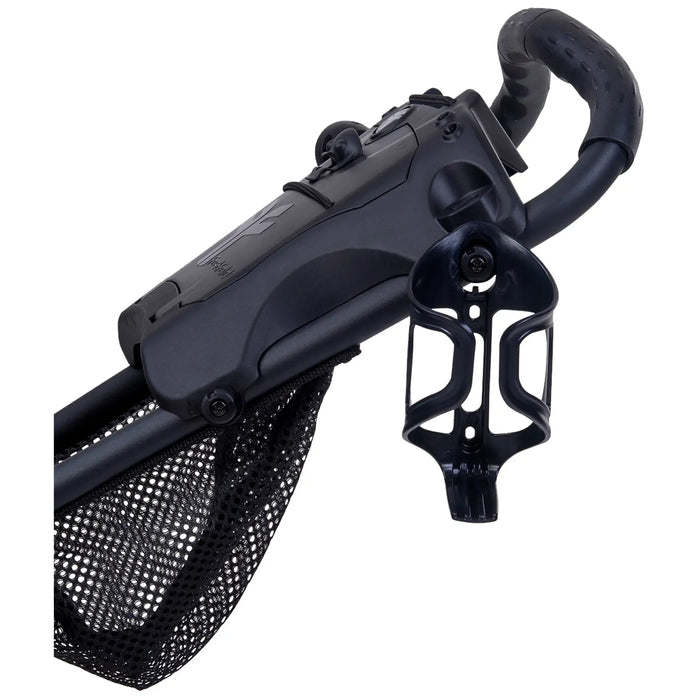 A black stroller handle is visible featuring a storage net underneath and a cup holder attached to the side designed for carrying beverages while strolling through various environments.