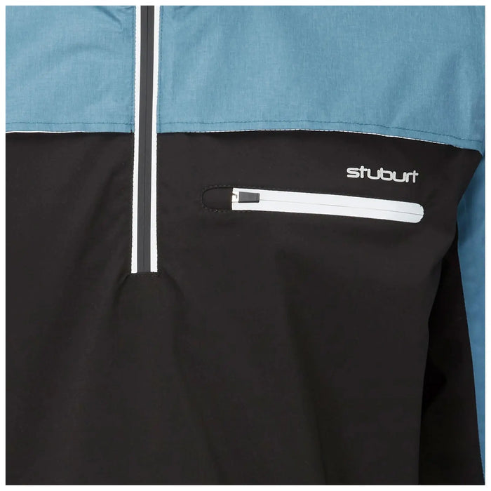 A windbreaker features a blue upper section and a black lower section with a zippered pocket. The brand "stuburt" is displayed on the black area, emphasizing a sporty style.